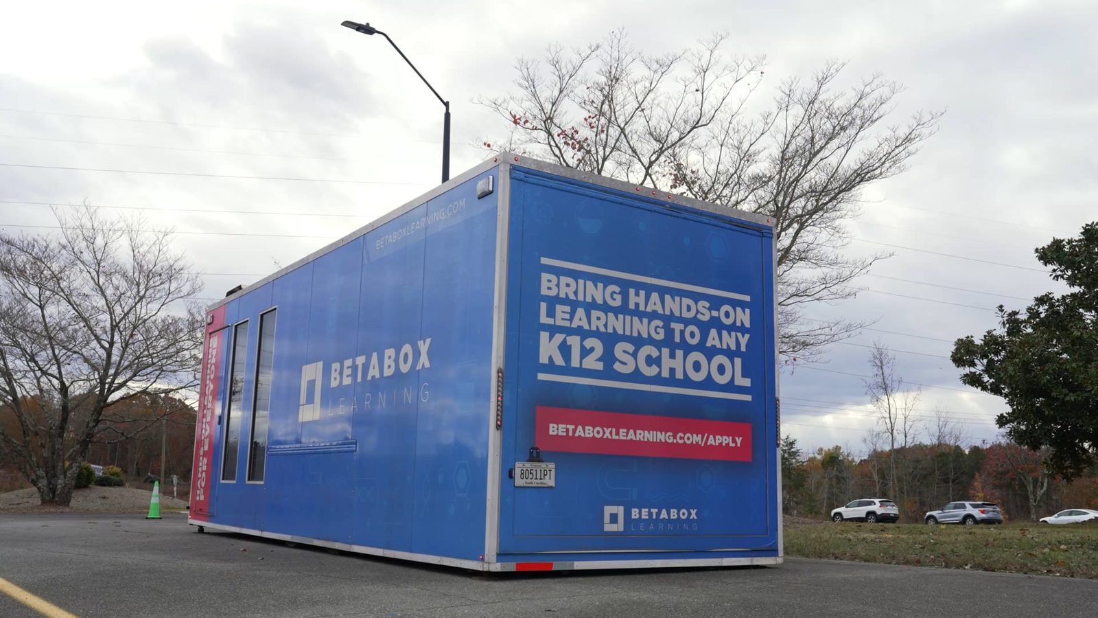 A Betabox mobile lab parked at a school