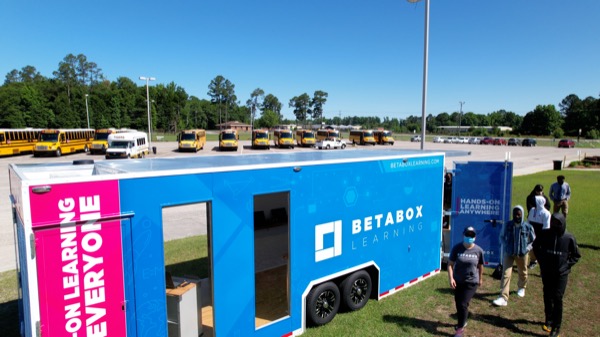 A Betabox mobile lab parked at a school